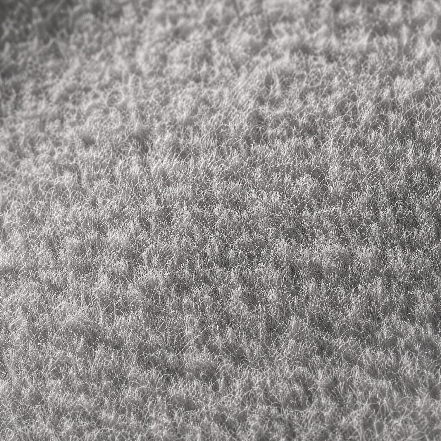 Macro of a brushed fleece, showing a dense standing pile of cut fibre